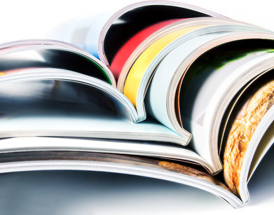 stack of the colorful magazines
